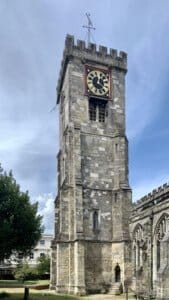 The tall, thin tower incorporated into later south aisle.