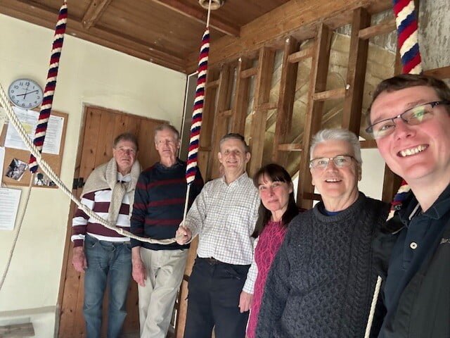 The quarter peal ringers in the ringing chamber