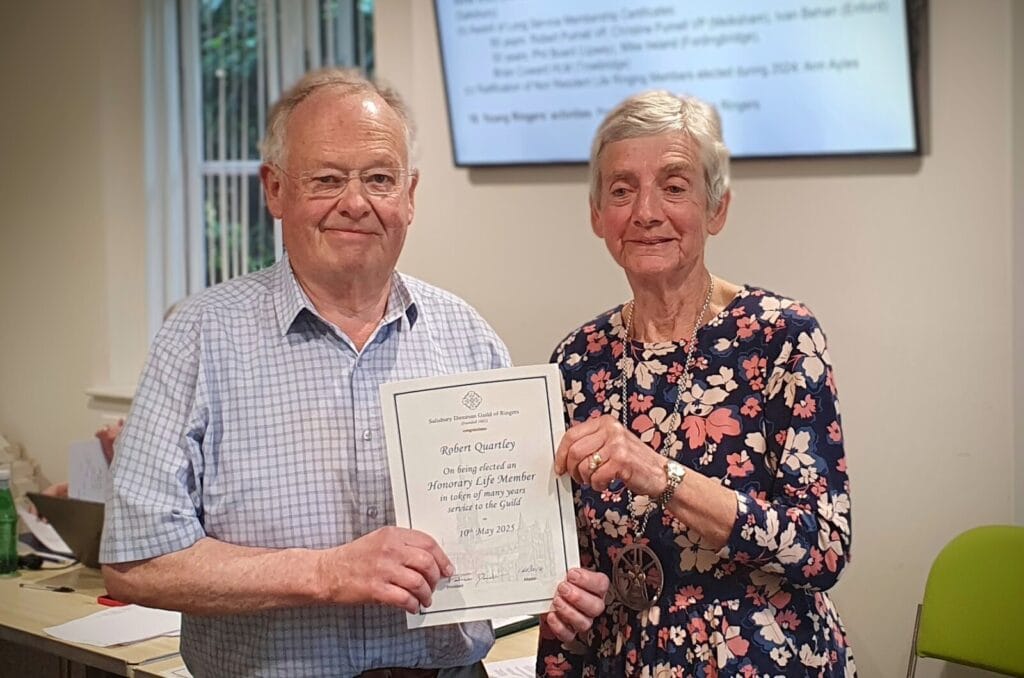Robert Quartley being presented with his certificate of Honorary Life Membership by Pat Davidson