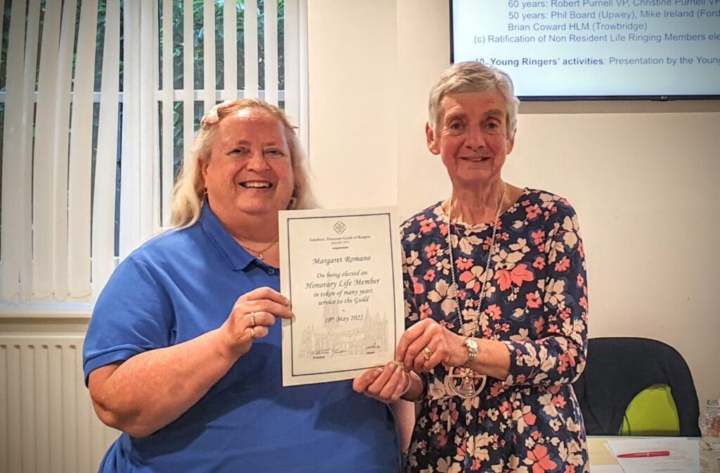 Margaret Romano presented with her certificate of Honorary Life Membership by Pat Davidson