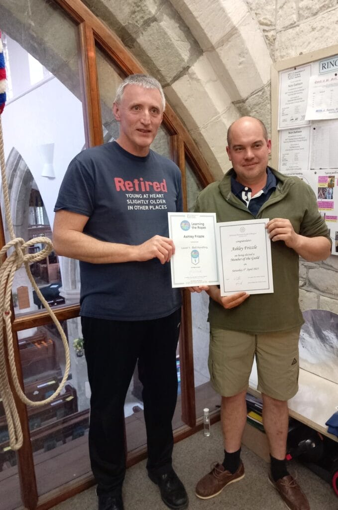 Ashley Frizzle receiving his guild membership and LTR1 certificates