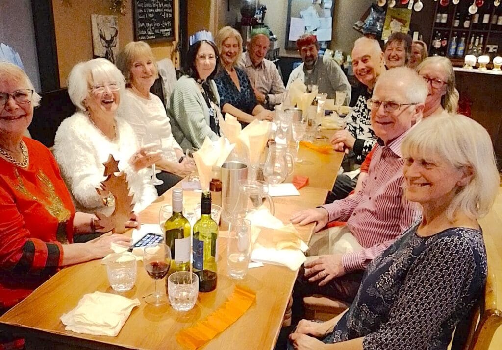 The Shipton Gorge band celebrate their first Christmas dinner with their supporters.