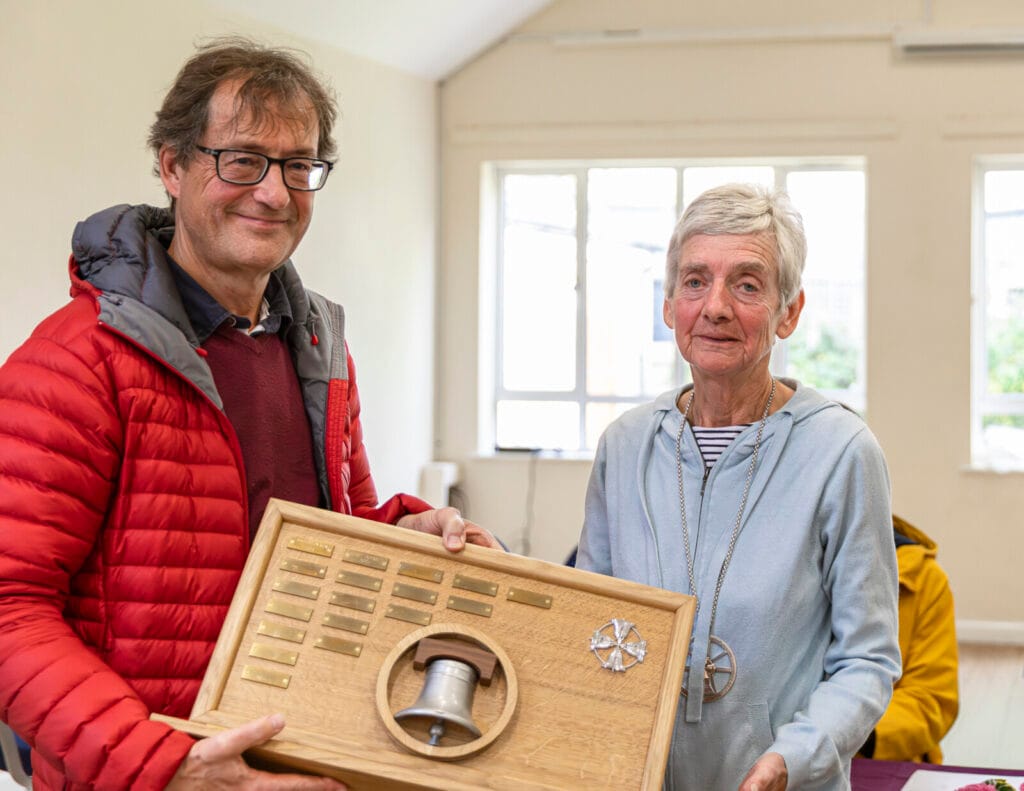 David Warwick being presented with the 8-bell trophy from Pat Davidson on behalf of Wimborne Minster