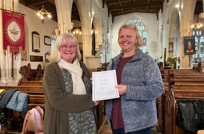 The Guild Master Vicki Rowse presenting Wyke Regis’ new member Helen Treacher with her certificate