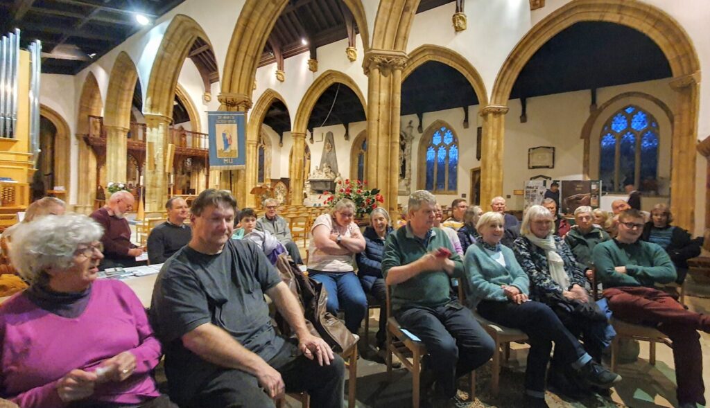West Dorset AGM attendees sat in the church