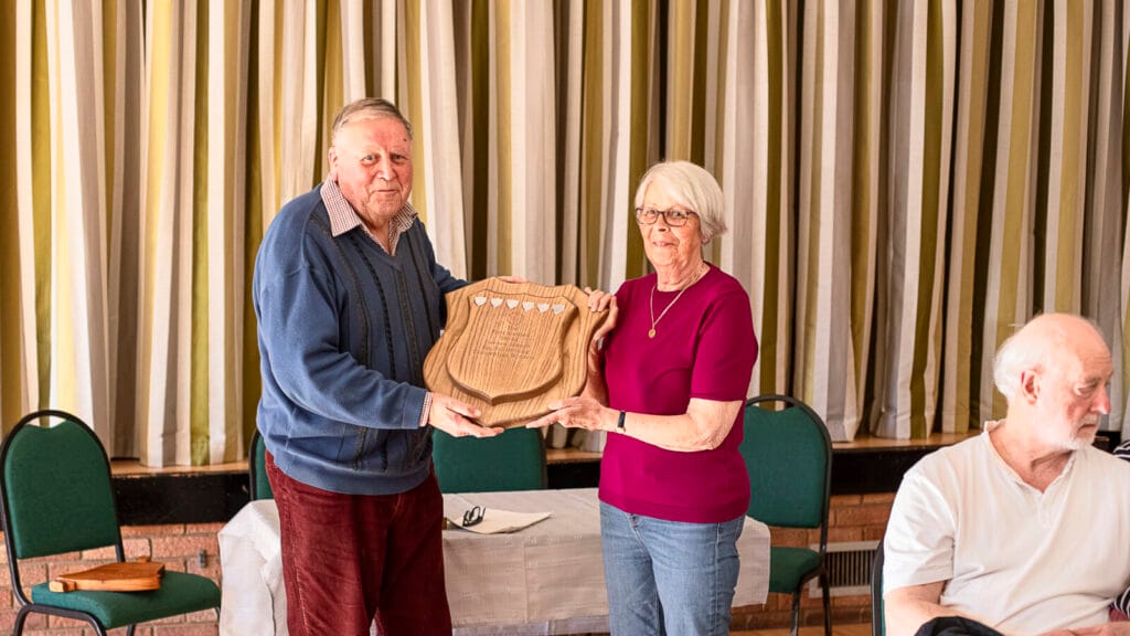 Pam Ebsworth receiving the trophy on behalf of Melksham for the 6-bell competition