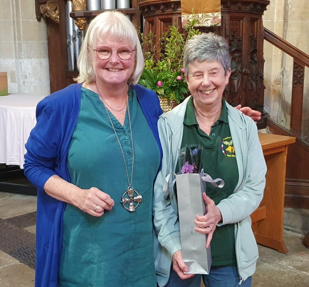 Retiring General Secretary, Kathryn Tyson, is presented with a small gift in gratitude for her service