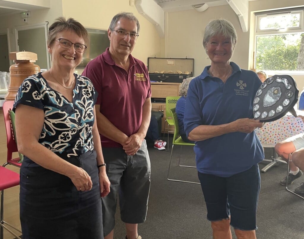 Sylvia Davidson collects the Novice Shield on behalf of Lytchett Minster