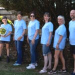 Guild Novice Comp Chiseldon 2026 - The winning "Devizes Dingers" band of Patrick Noonan (9), Becca Hunt-Davis, Julia McGrath, Angie Best, Judy Jones and Peter Kendall (in ringing order and with numbers on their team t-shirts) [Photo: Sarah Jane Dow]