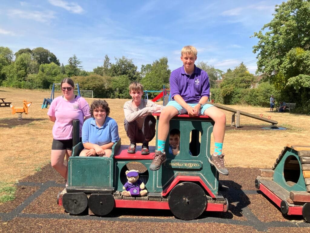 Five of the Young Ringers on a playground ride
