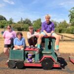 Five of the Young Ringers on a playground ride