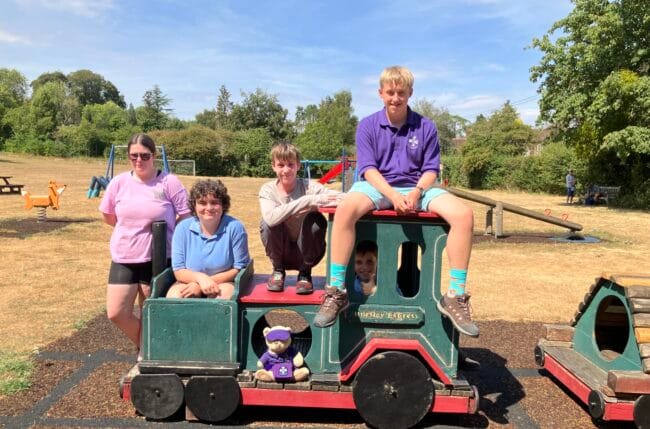 Five of the Young Ringers on a playground ride